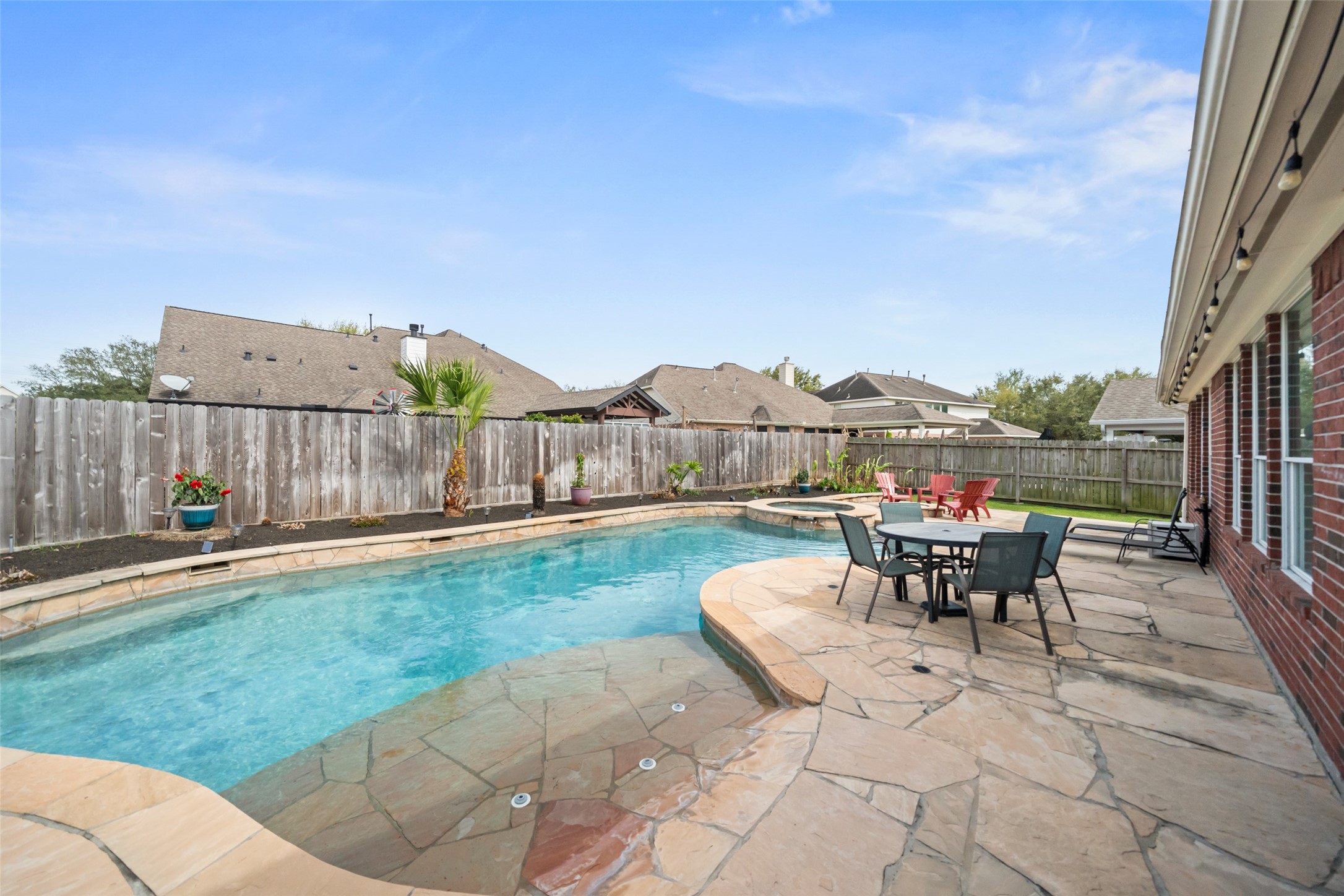 6010 Foxland Court Spring, TX 77379 - Photo 29 of 43 Come enjoy this backyard oasis! Notice the beached entryway to the pool!