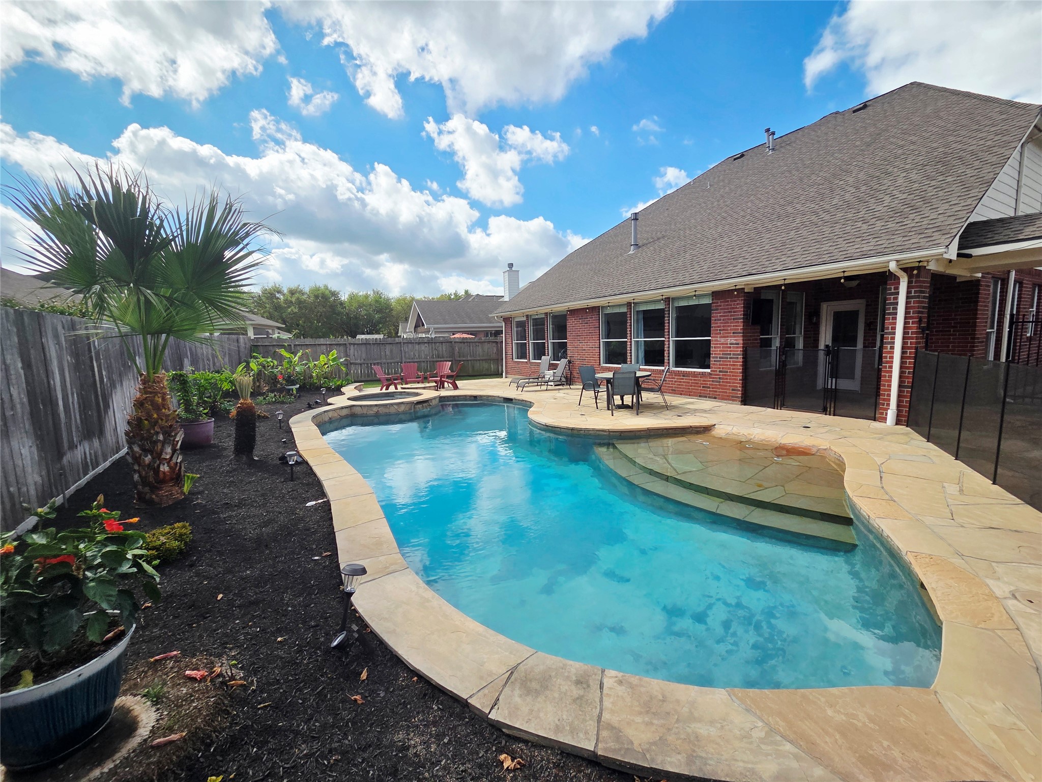 6010 Foxland Court Spring, TX 77379 - Photo 30 of 43 Home has beautiful landscaping & a covered patio!
