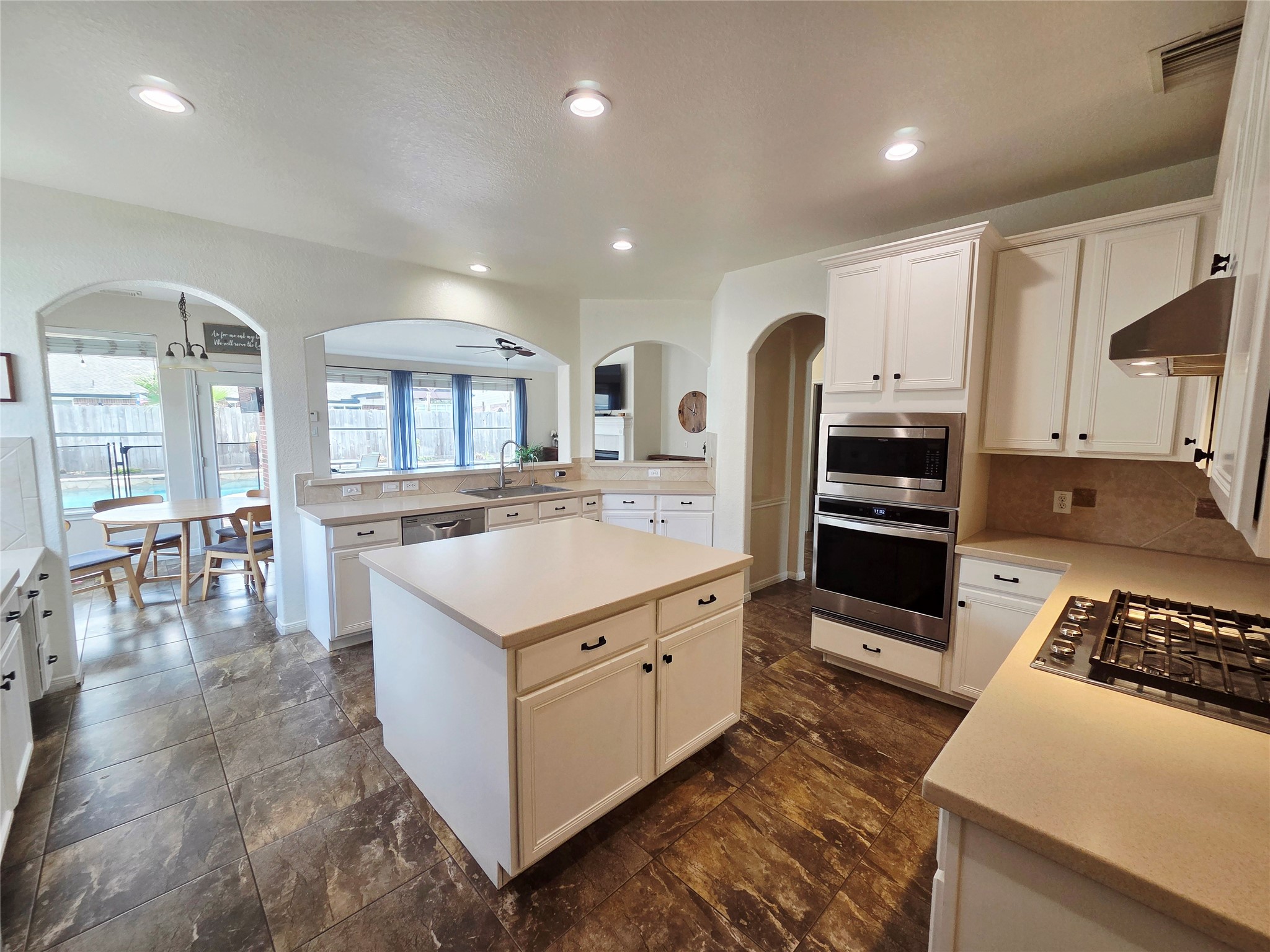 6010 Foxland Court Spring, TX 77379 - Photo 6 of 43 The spacious kitchen features modern stainless steel appliances, with a huge island, and lots of storage.