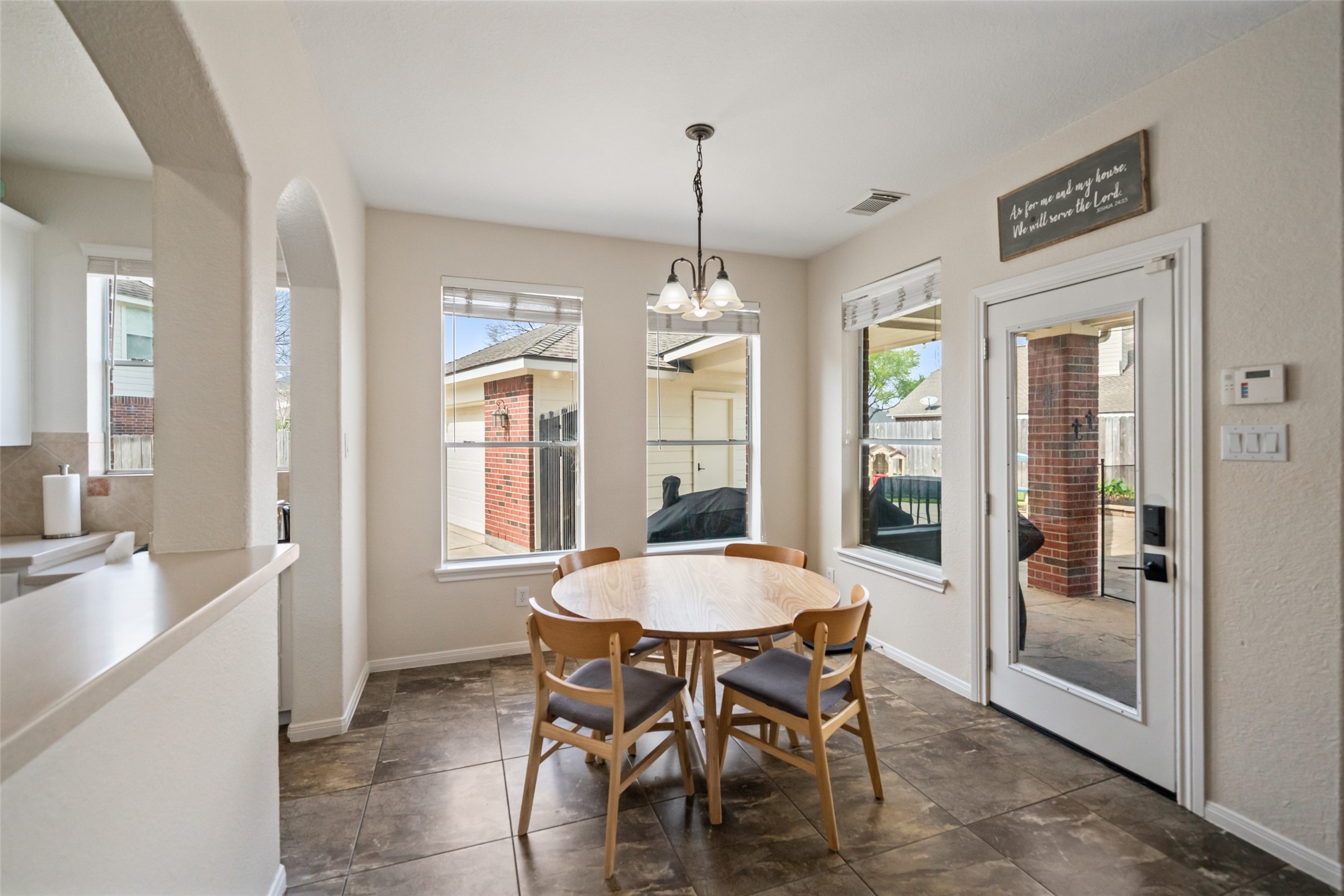 6010 Foxland Court Spring, TX 77379 - Photo 10 of 43 The kitchen opens up to the breakfast nook that has plenty of ample natural light from all the windows.