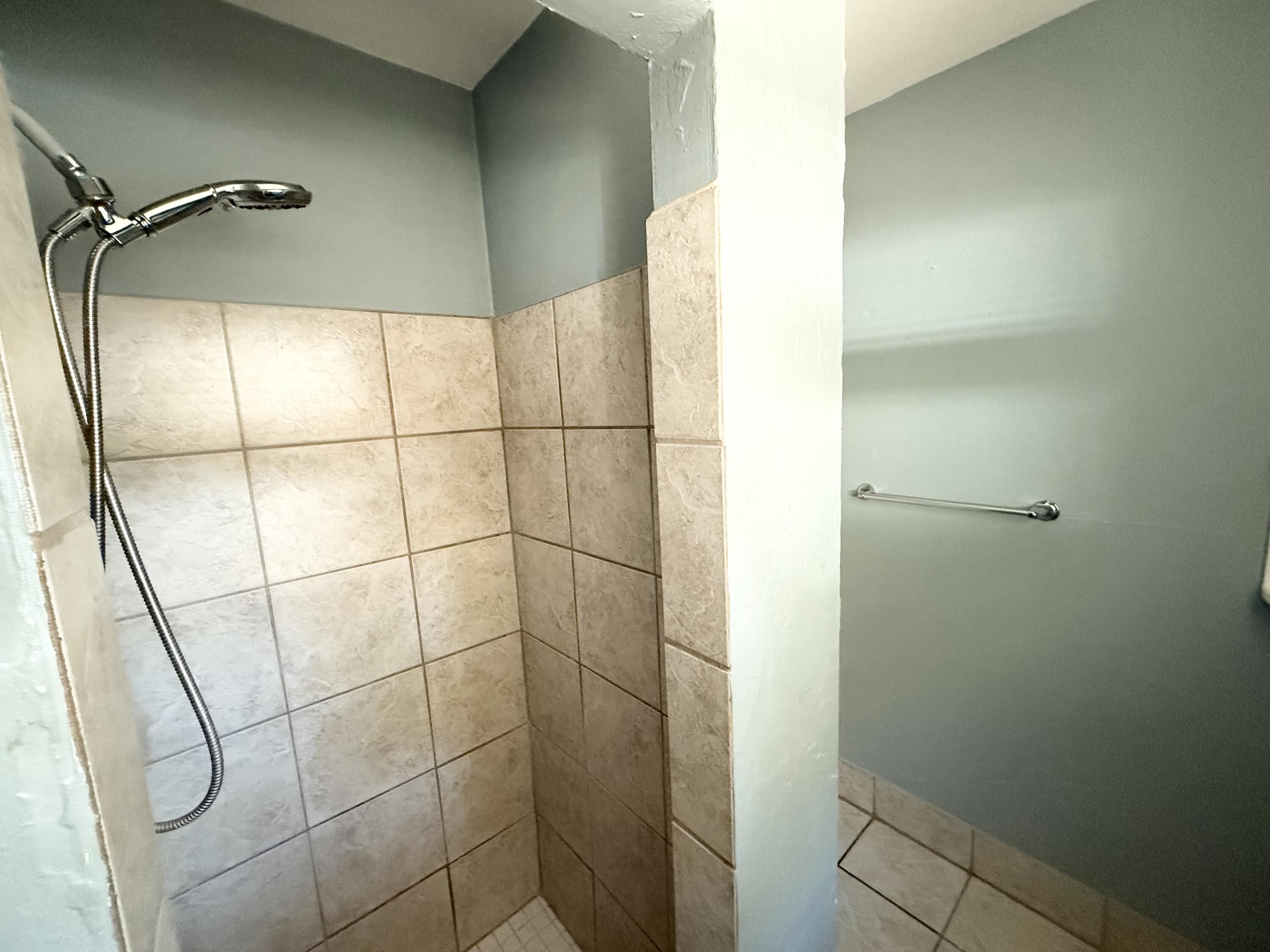 311 Wildermere Road West Palm Beach, FL 33401 - Photo 19 of 27 a bathroom with a shower