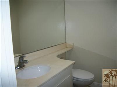 42356 Dunes View Road, Unit 7 Rancho Mirage, CA 92270 - Photo 8 of 9 a bathroom with a sink and toilet