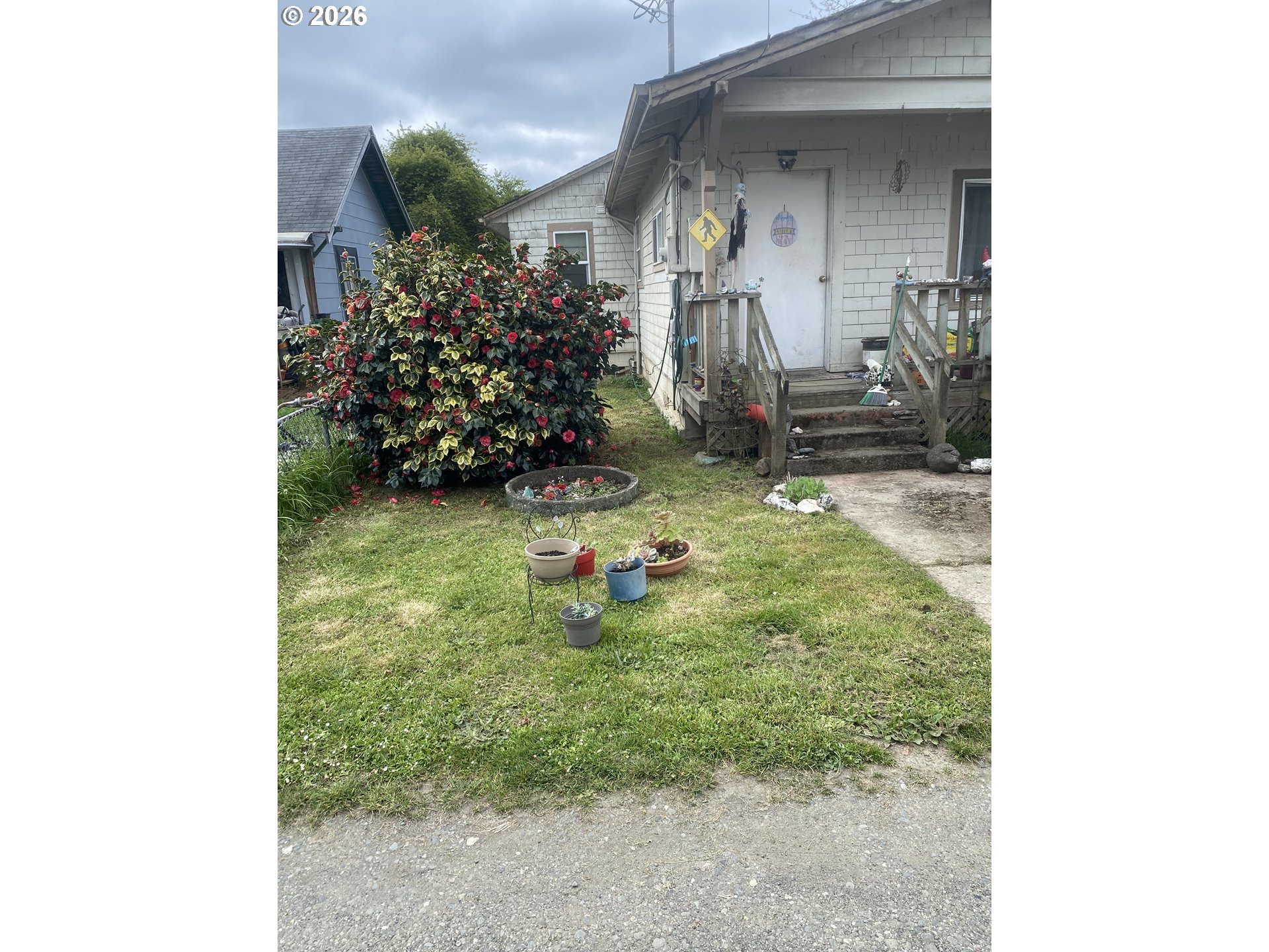 93840 High Lane Coos Bay, OR 97420 - Photo 2 of 7 a view of a porch with a yard