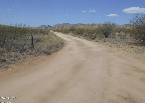 a view of mountain view with mountains in the background