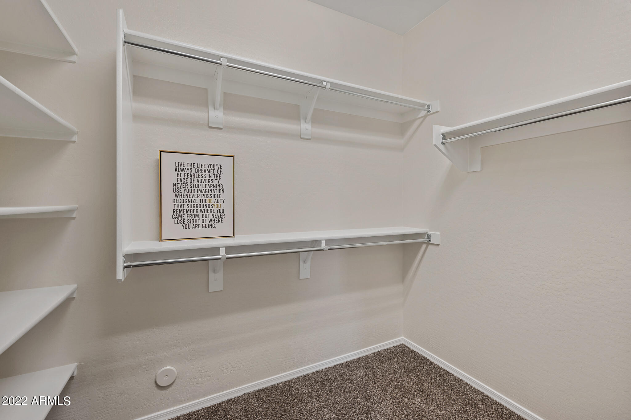 1757 Grenadine Road Phoenix, AZ 85040 - Photo 13 of 29 LARGE WALK-IN CLOSET IN PRIMARY BEDROOM