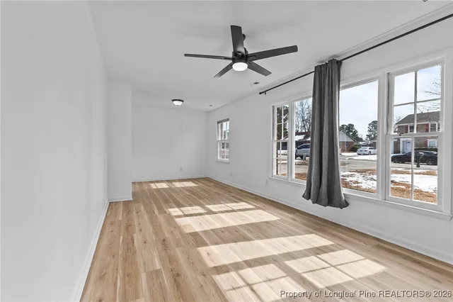 a view of an empty room and window