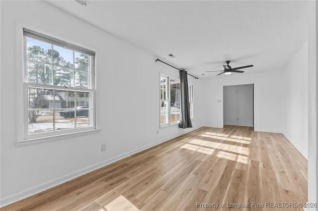 a view of an empty room and window