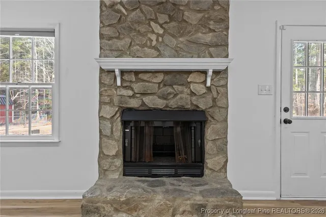 a living room with a fireplace