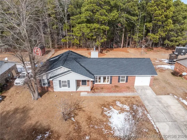 a house view with a outdoor space