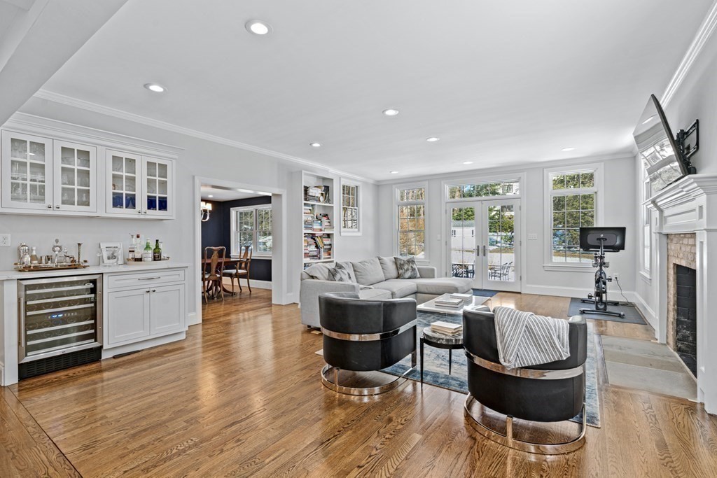 71 Fuller Brook Road Wellesley, MA 02482 - Photo 11 of 24 a living room with fireplace furniture and a large window