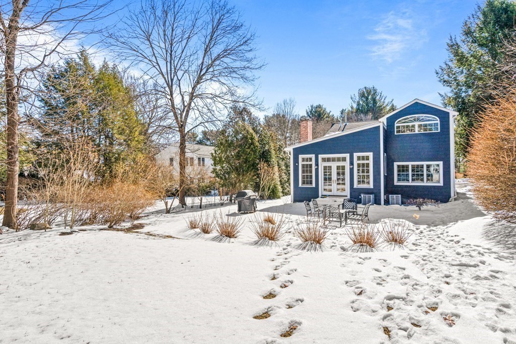 71 Fuller Brook Road Wellesley, MA 02482 - Photo 23 of 24 a view of a house with snow on the road