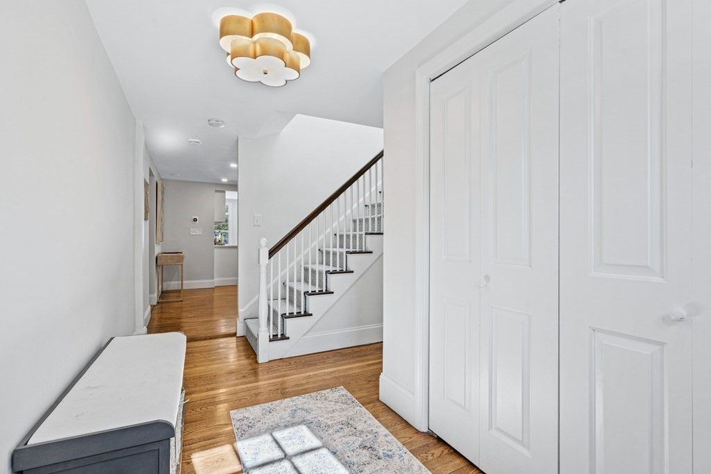 71 Fuller Brook Road Wellesley, MA 02482 - Photo 4 of 24 a view of entryway and hall with a rug