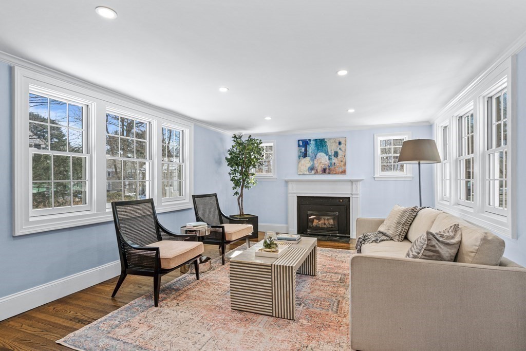 71 Fuller Brook Road Wellesley, MA 02482 - Photo 5 of 24 a living room with furniture and a fireplace