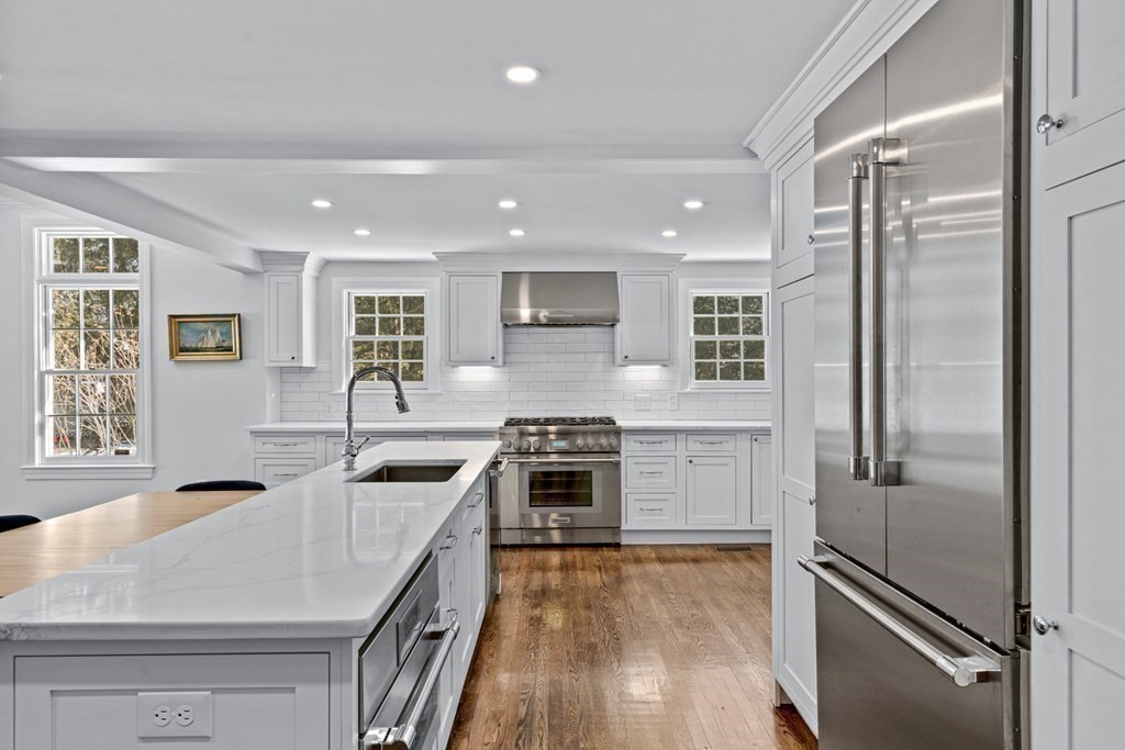 71 Fuller Brook Road Wellesley, MA 02482 - Photo 8 of 24 a kitchen with a stove a refrigerator and a sink