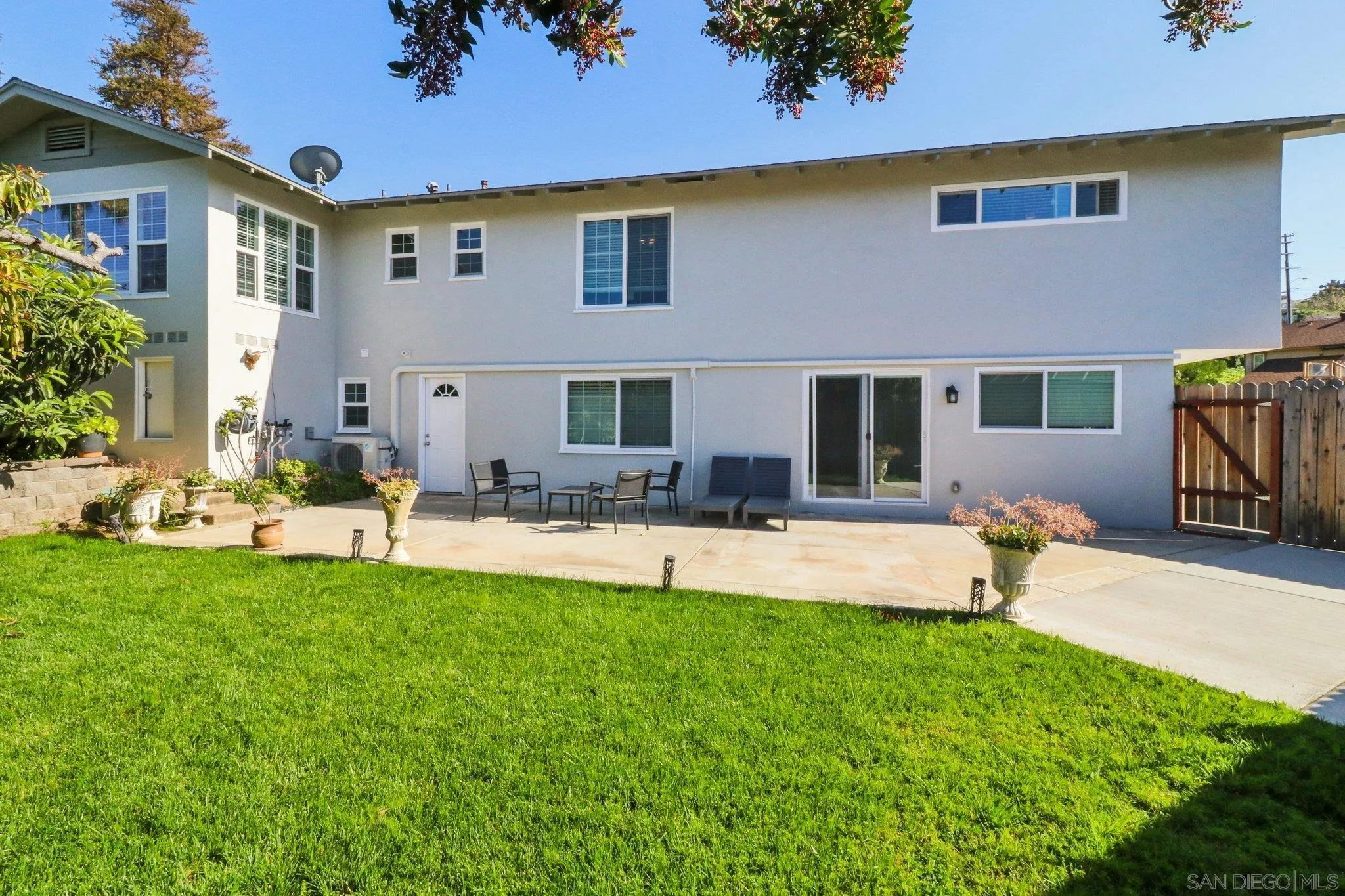 10420 Loma Rancho Drive Spring Valley, CA 91978 - Photo 25 of 41 a view of a house with swimming pool and sitting area