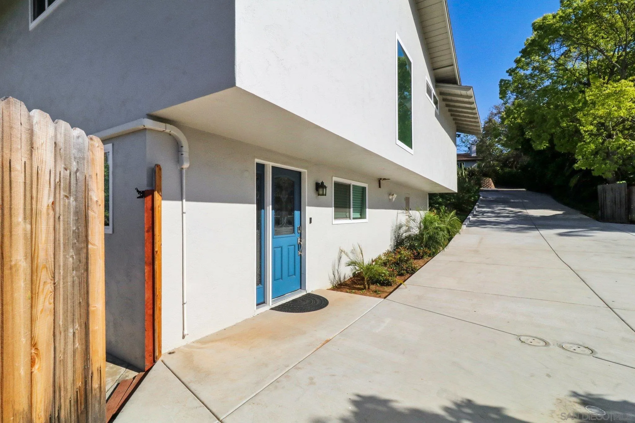 10420 Loma Rancho Drive Spring Valley, CA 91978 - Photo 26 of 41 a front view of a house with a yard