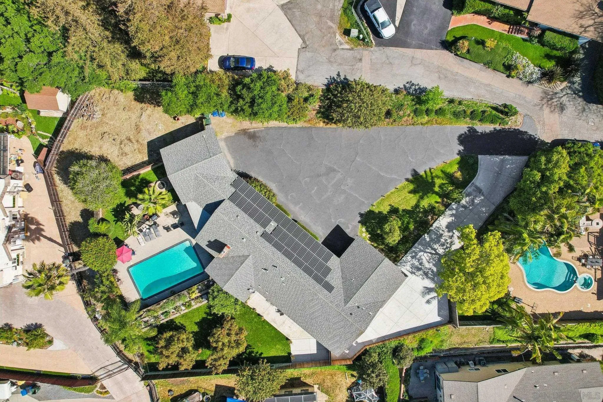 10420 Loma Rancho Drive Spring Valley, CA 91978 - Photo 39 of 41 an aerial view of a house with a yard and garden