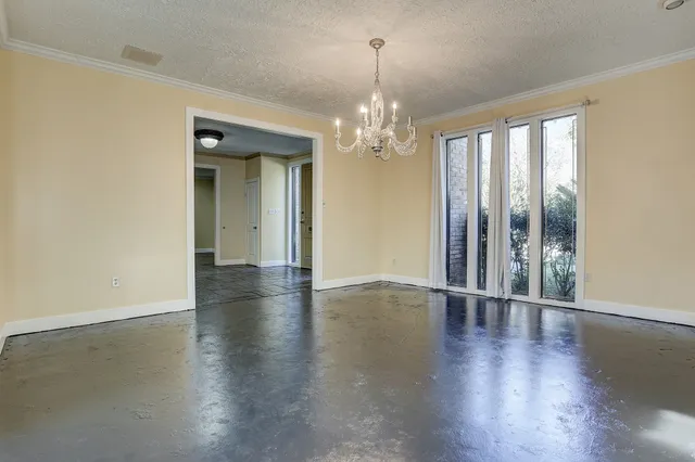 a bathroom with a shower sink vanity mirror and toilet