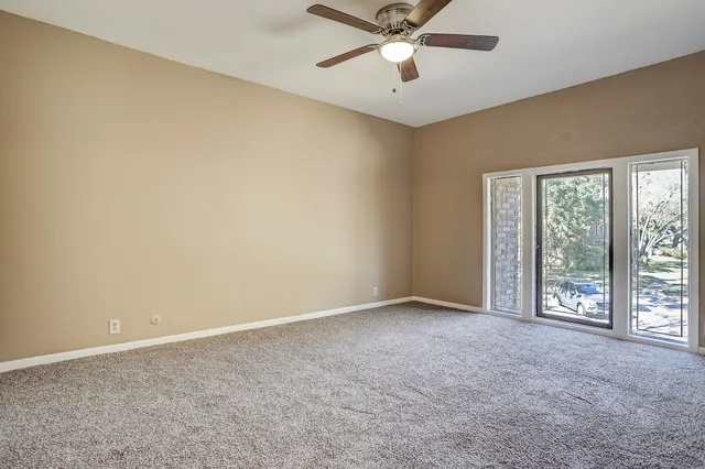 a view white cabinets and sink