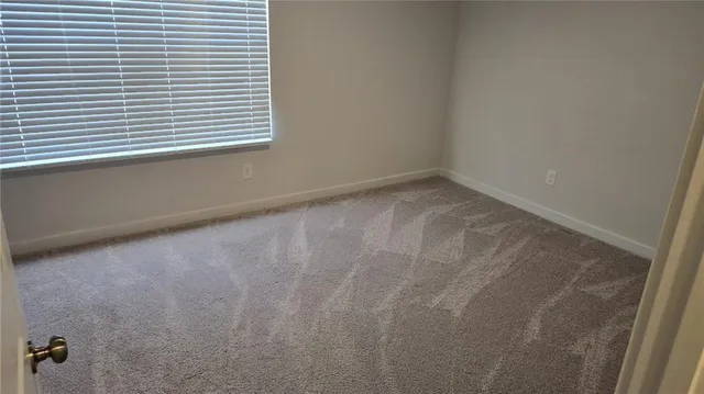 a view of a room that has a window in it