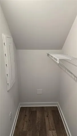 a view of a room with racks on the wall