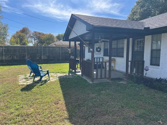 a view of a swimming pool with a patio