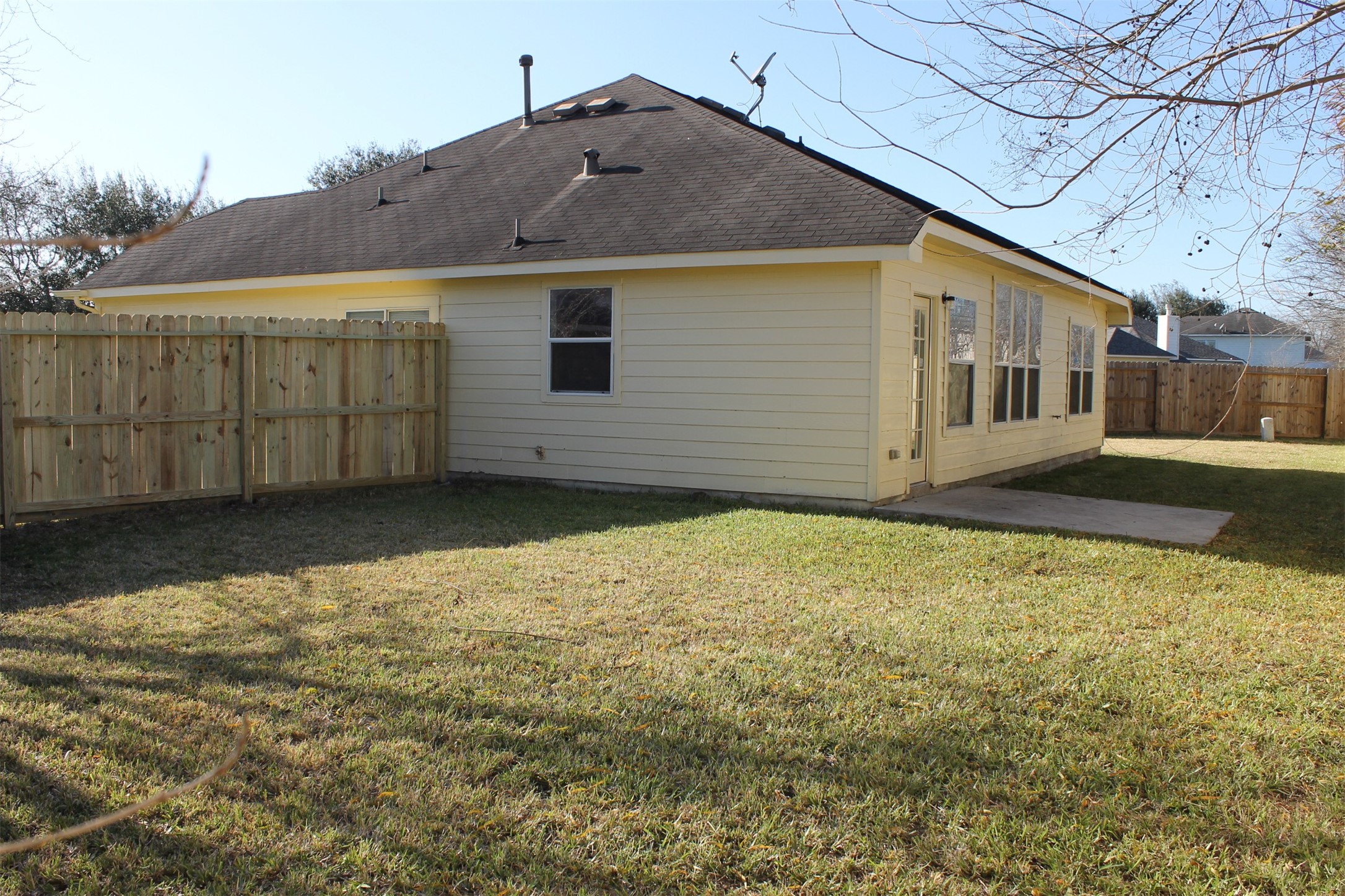 4031 Raspberry Court Dickinson, TX 77539 - Photo 23 of 24 a view of a house with a backyard