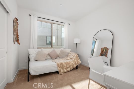 165 Frame Irvine, CA 92618 - Photo 21 of 37 a living room with furniture and a large window