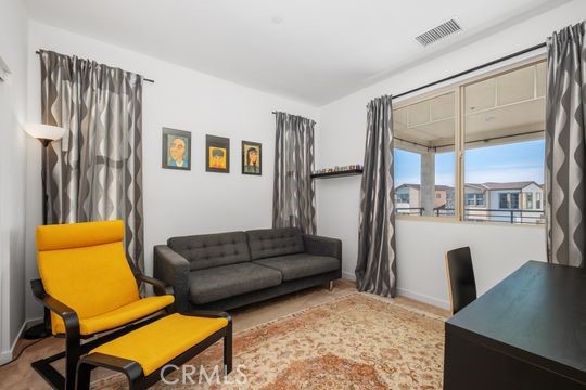 165 Frame Irvine, CA 92618 - Photo 23 of 37 a living room with furniture and a window