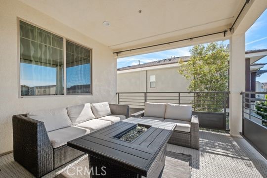 165 Frame Irvine, CA 92618 - Photo 25 of 37 a living room with furniture and a window
