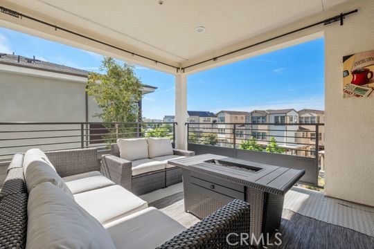 165 Frame Irvine, CA 92618 - Photo 29 of 37 a living room with furniture and a floor to ceiling window