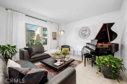 165 Frame Irvine, CA 92618 - Photo 3 of 37 a living room with furniture and wooden floor