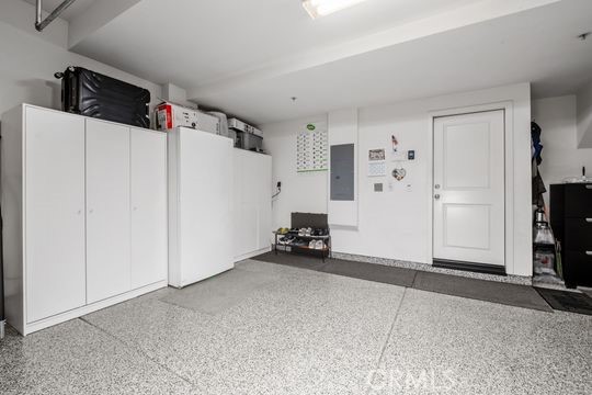 165 Frame Irvine, CA 92618 - Photo 36 of 37 a view of a livingroom with furniture and a refrigerator