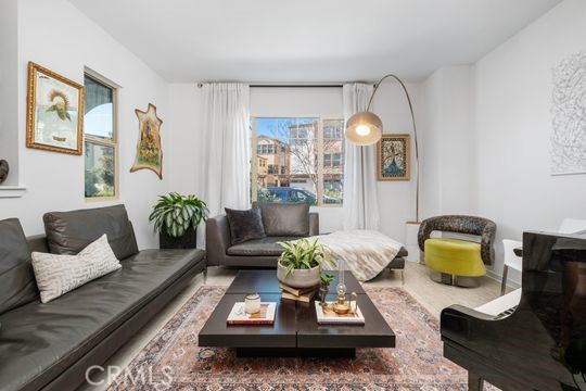 165 Frame Irvine, CA 92618 - Photo 4 of 37 a living room with furniture and wooden floor