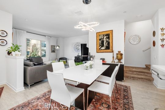 165 Frame Irvine, CA 92618 - Photo 5 of 37 a view of a dining room with furniture