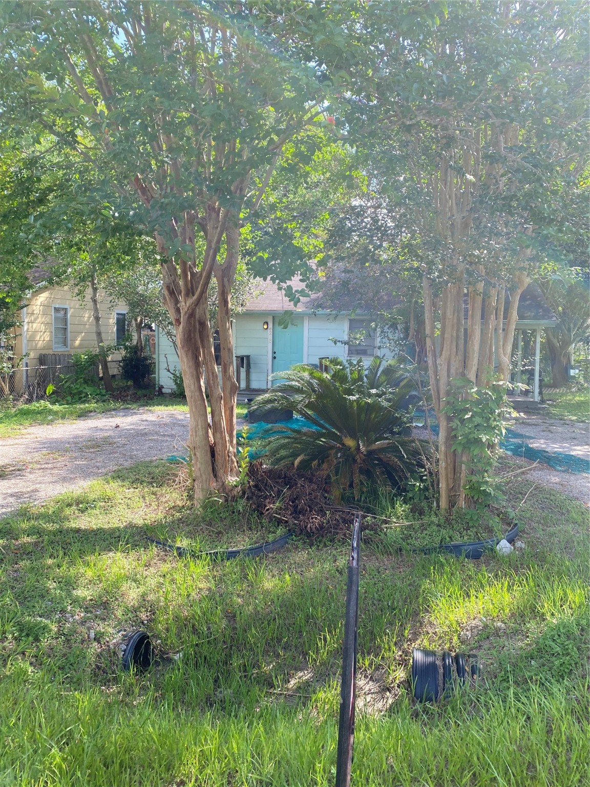 4213 Kinne Street Bacliff, TX 77518 - Photo 2 of 5 a view of backyard of house with green space