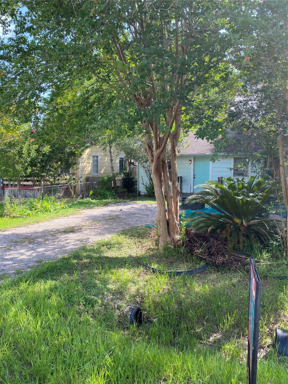 4213 Kinne Street Bacliff, TX 77518 - Photo 3 of 5 a backyard of a house with lots of green space