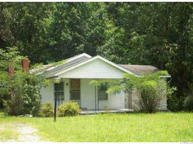 3230 Redwood Road Durham, NC 27704 - Photo 1 of 1 a view of a house with backyard and garden