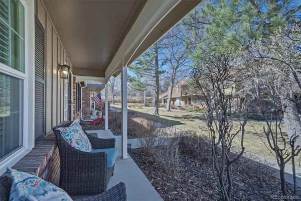 a view of balcony with furniture