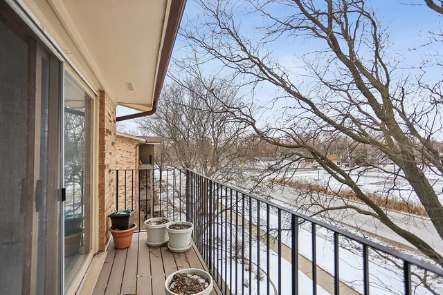 a view of a house with backyard and chair