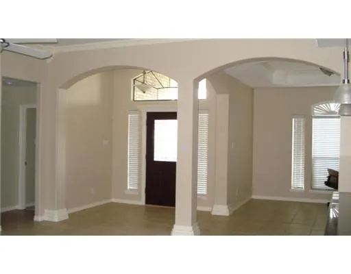 a black and white photo of a living room