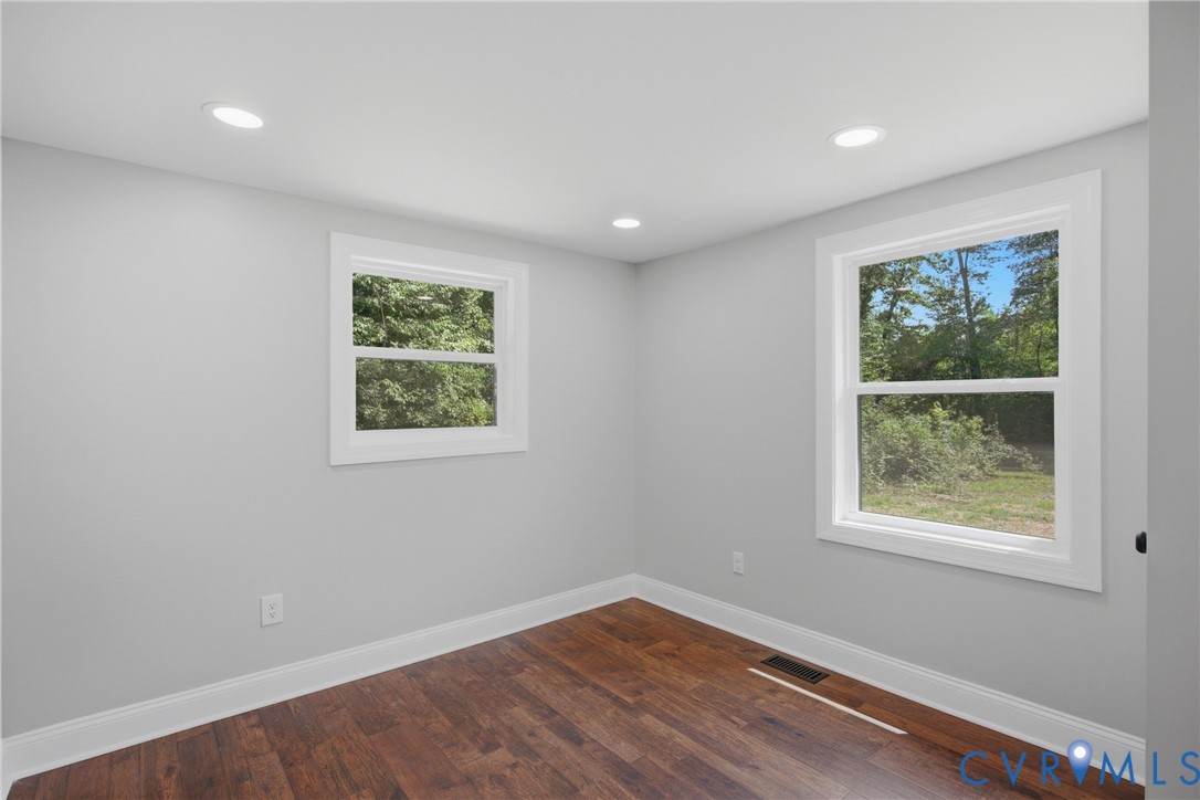 3497 Bumpass Road Beaverdam, VA 23015 - Photo 16 of 28 Bright room featuring two windows with white trim,