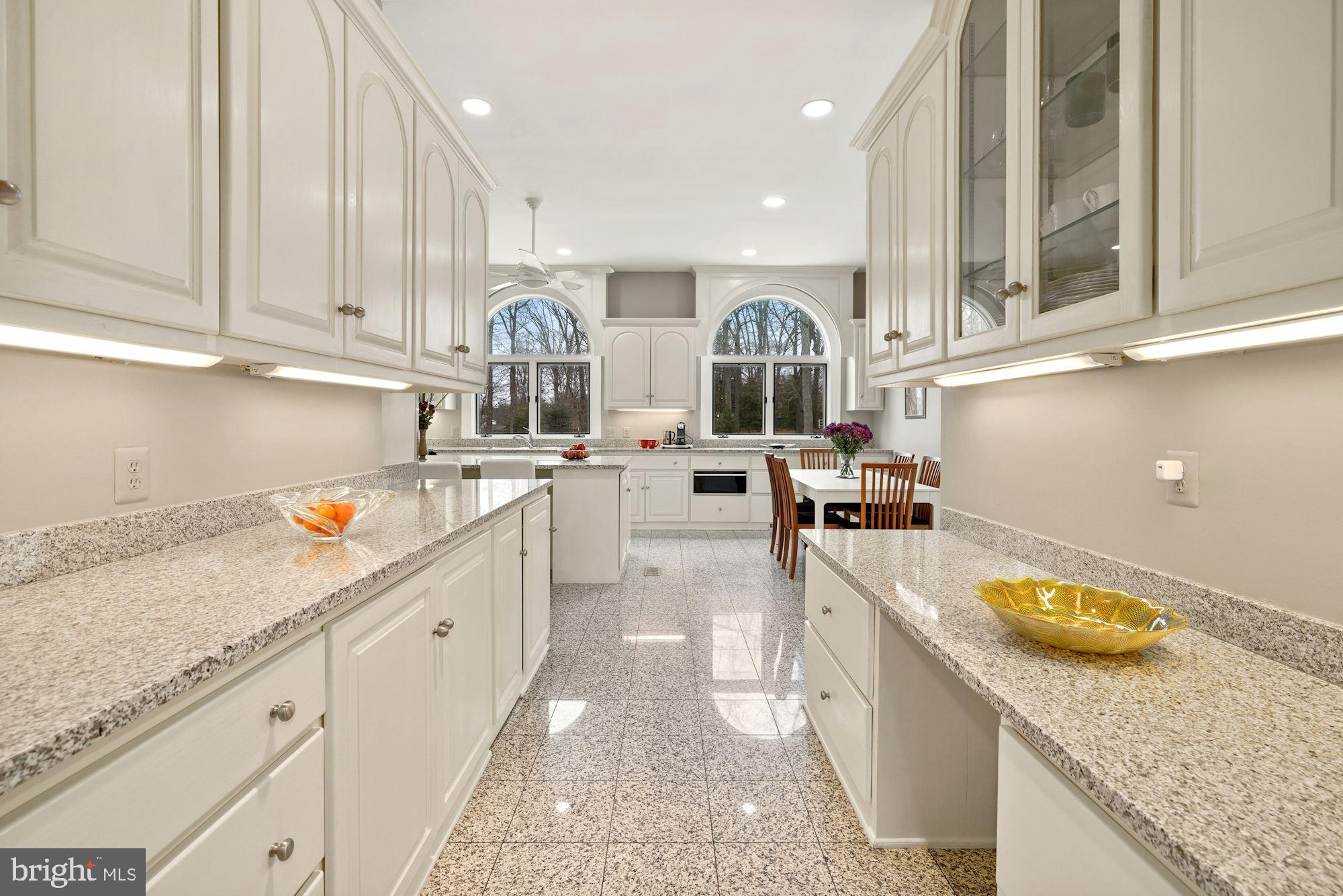 11505 Glen Road Potomac, MD 20854 - Photo 14 of 66 The gourmet island kitchen is a chef’s dream