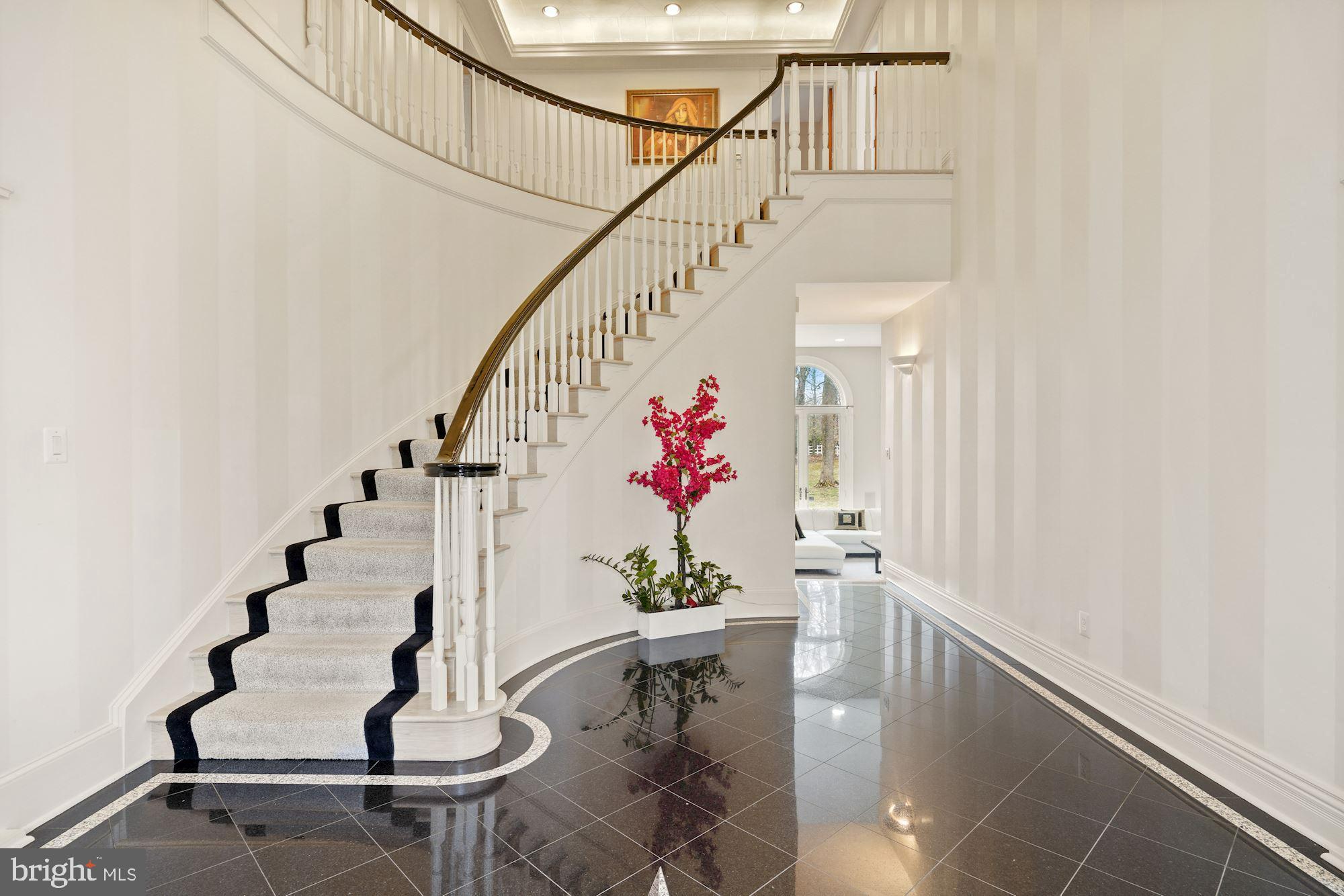 11505 Glen Road Potomac, MD 20854 - Photo 6 of 66 A grand 2 story foyer w granite floors