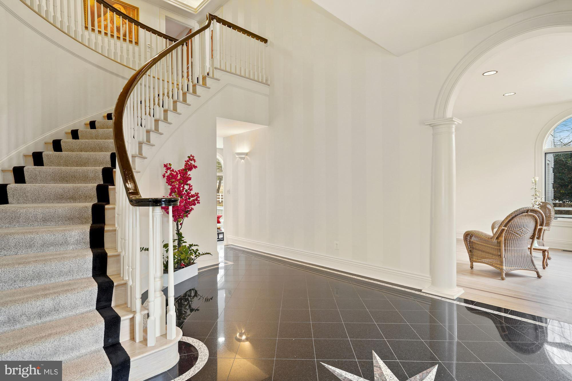 11505 Glen Road Potomac, MD 20854 - Photo 9 of 66 Elegant curved staircase & a pair of guest closets