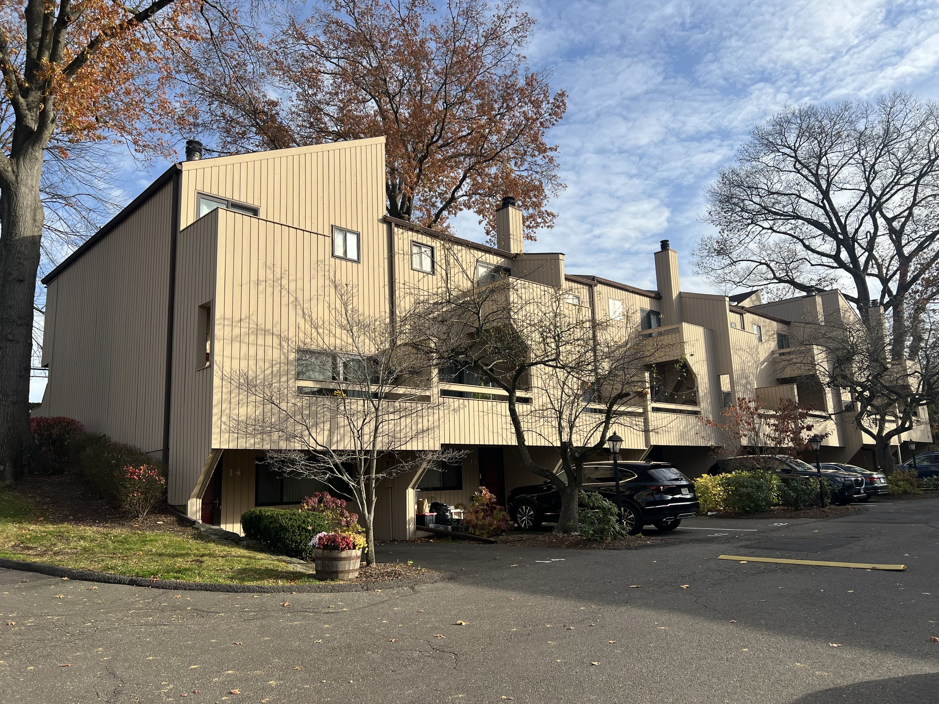 100 Hope Street, Unit 10 Stamford, CT 06906 - Photo 2 of 14 a view of a street with cars