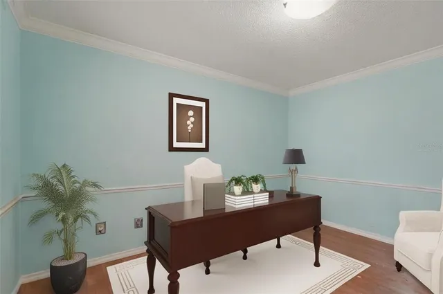 a view of a workspace with furniture