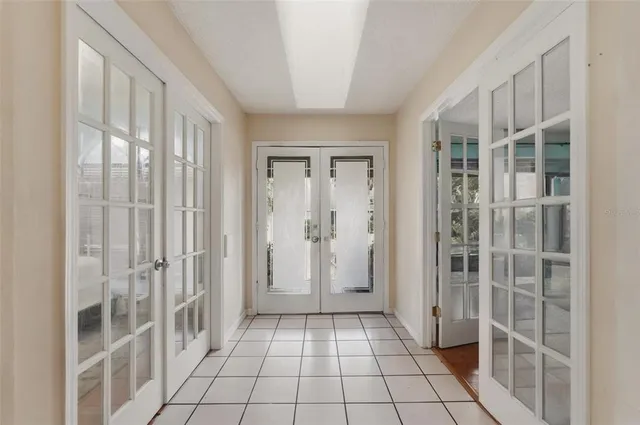 a view of empty room with windows