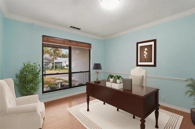 a living room with furniture and a window