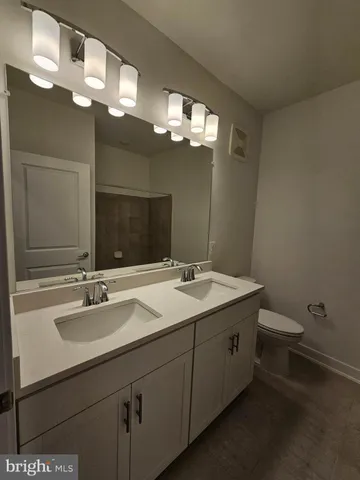 a bathroom with a tub and shower